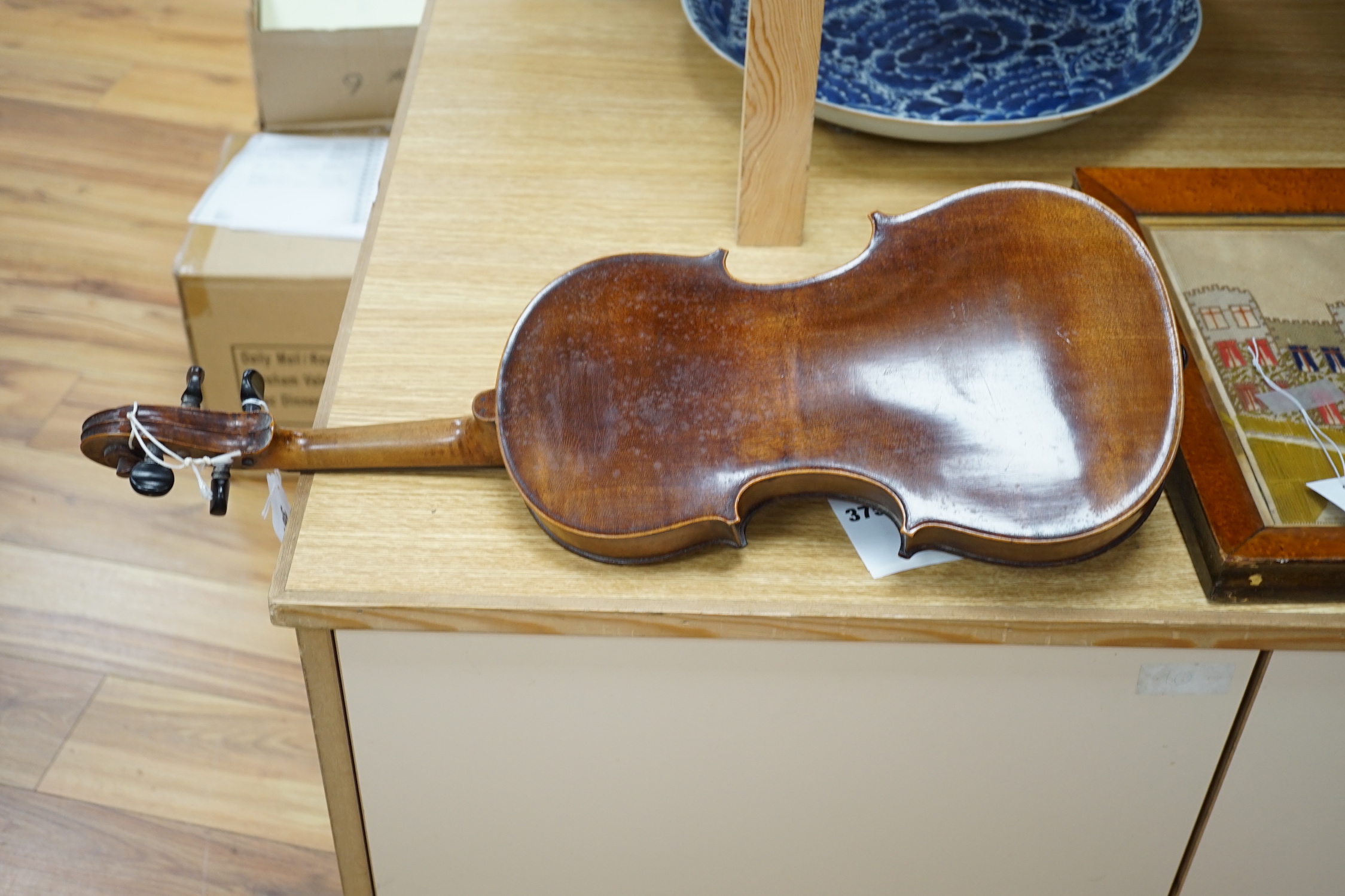 A Saxony violin, interior label reads ‘Sebastian Lloz An 1700’, back measures 36cm